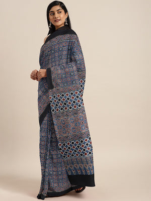 Blue Ajrakh Handblock Print Saree With Blouse Piece SKAJSA0001 SKAJSA0001-Saree-Kalakari India-SKAJSA0001-Ajrakh, Geographical Indication, Gujrat, Hand Crafted, Heritage Prints, Natural Dyes, Pure Cotton, Sarees, Sustainable Fabrics, Woven-[Linen,Ethnic,wear,Fashionista,Handloom,Handicraft,Indigo,blockprint,block,print,Cotton,Chanderi,Blue, latest,classy,party,bollywood,trendy,summer,style,traditional,formal,elegant,unique,style,hand,block,print, dabu,booti,gift,present,glamorous,affordable,coll